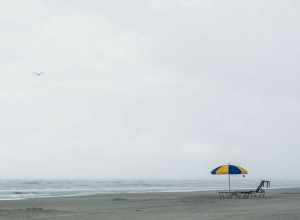 
500px provided description: Emptiness [#umbrella ,#beach ,#cloudy ,#empty ,#loneless ,#Landscape ,#Ocean]
