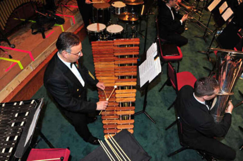 100322-N-2257C-003 MARTINEZ, GEORGIA (March 22, 2010) Senior Chief Musician Juan Vazquez, Navy Band percussionist, warms up on marimba prior to an evening tour concert at the West Acres Baptist Church in Martinez, Ga. The Concert Band is currently on