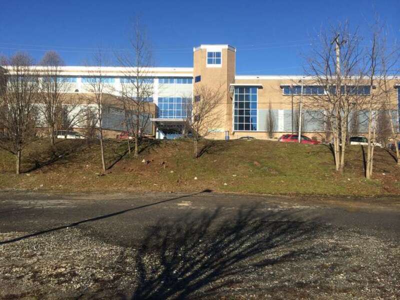 1100 Key Highway, site of proposed 305 unit apartment building, looking east at Digital Harbor HS