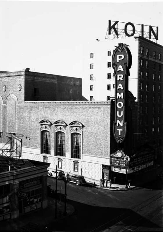 Paramount Theatre. 1037 SW Broadway, Portland, Oregon. August 5, 1939. Billboard advertises Irving Berlin's Second Fiddle, starring Sonja Henie, Tyrone Power, and Rudee Valley, and The Lady and The Mob with Ida Lupino. The Paramount later became the
