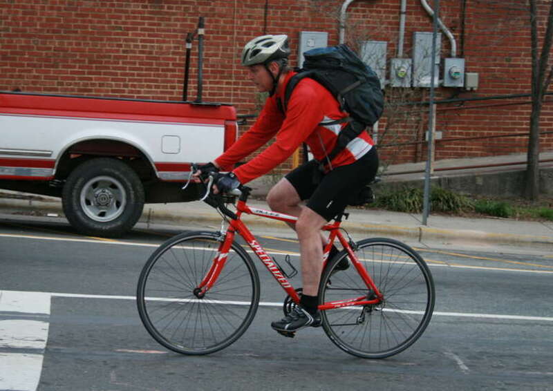 A cyclist on S Greensboro Street in Carrboro, North Carolina (USA).