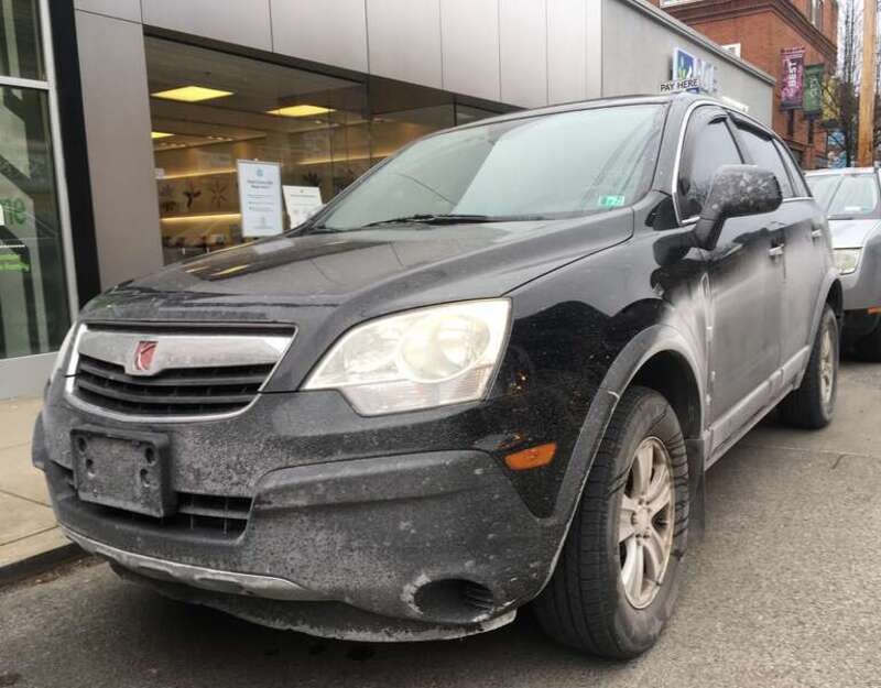A 2008 Saturn VUE XE in Black Onyx.