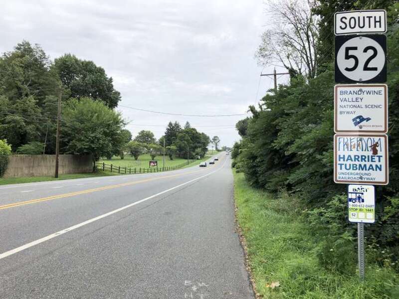 View south along Delaware State Route 52 (Kennett Pike) at Old Kennett Road in Winterthur, New Castle County, Delaware
