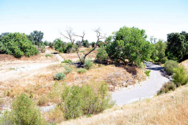 130715-A-QE256-022 – The levee system along Cache Creek in Yolo County, Calif., shown July 15, 2013. During winter months the levee channels water toward the Yolo Bypass and the Sacramento River, but remains mostly dry in the summer.  The U.S. Army