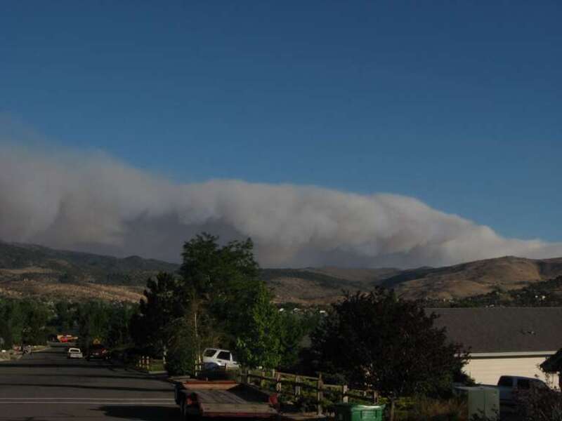 The uber-ominous plume of smoke arising from the Angora Fire near South Lake Tahoe, California. We drove from Reno to Winnemucca last night and the smoke plume had already traveled all the way to Winnemucca.
The Angora Fire was a wind driven fire
