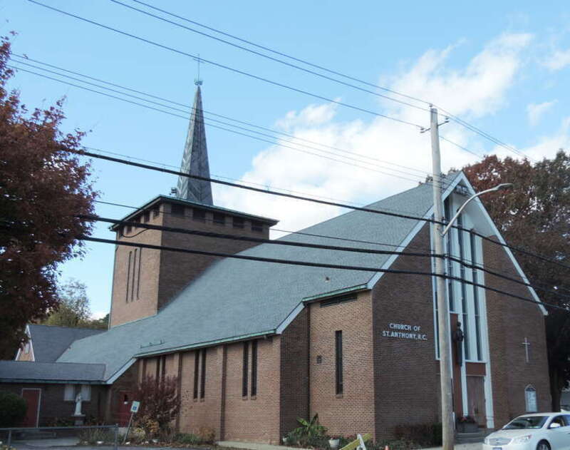 Looking northwest at church on a mostly sunny afternoon.