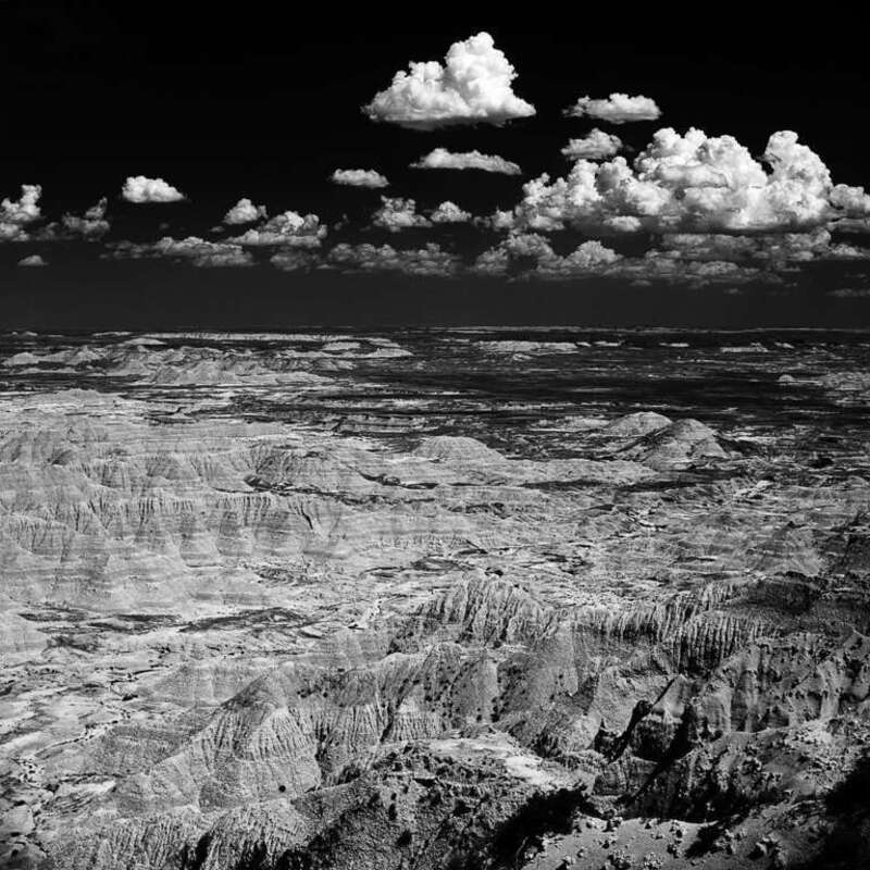 500px provided description: Badlands N P South Dakota [#clouds ,#b/w ,#south dakota ,#badlands n.p.]