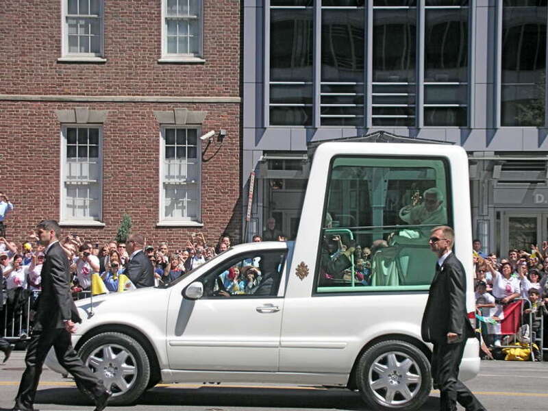 Pope Benedict XVI travels in his Popemobile on Pennsylvania Avenue in Washington, D.C. during his 2008 visit to the United States