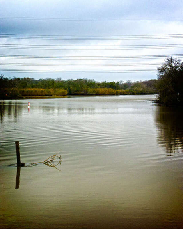 Clear Creek where it passes by Walter Hall Park in League City, TX