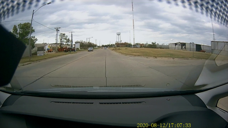 On the right, a Collins Aerospace building damaged in the derecho in Cedar Rapids, IA.