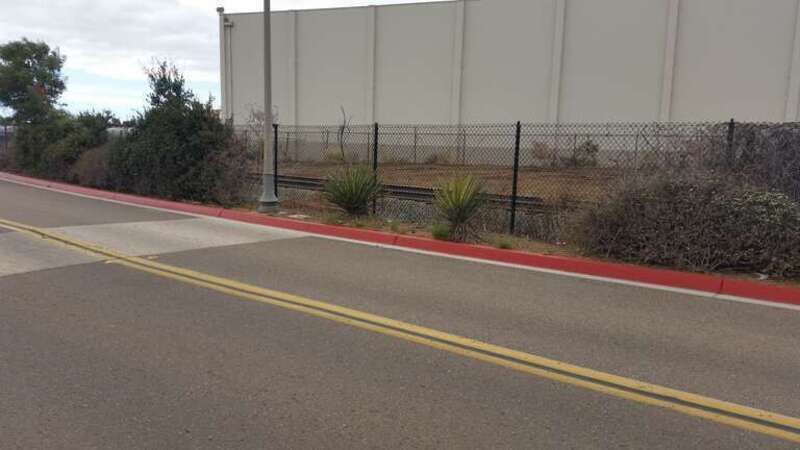 Located East of the National City Marine Terminal the rail is in the process of being removed east of the Dixieline Lumber wearhouse and south of the National City Cement Terminal, as seen from Marina Way