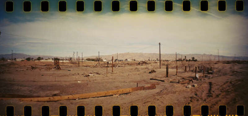 Dust to dust... The Salton Sea took back this portion of Bombay Beach, CA. Lomography Sprocket Rocket.