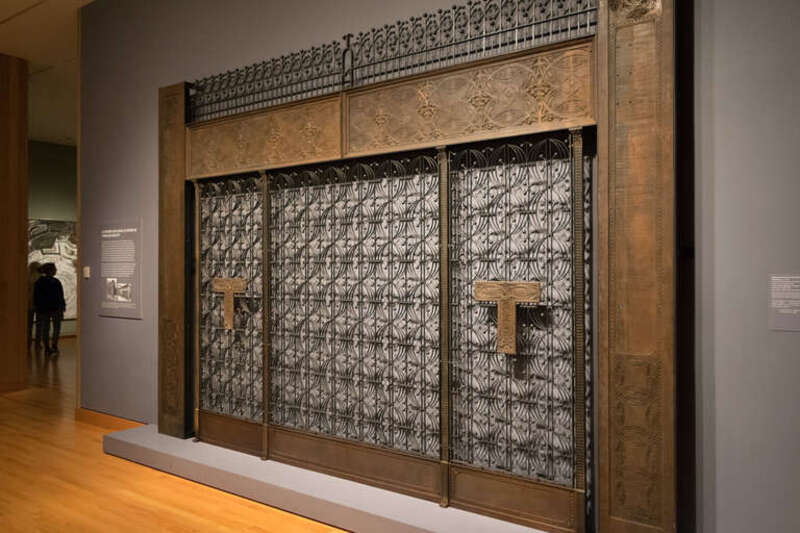 Elevator screen from the Chicago Stock Exchange. Ca. 1893–94. Winslow Brothers Company. Lintel, columns and kick plates: cast iron electroplated with copper. Grilles: cast and wrought iron protected with a Bower and Barff finish. Decorative T-shaped