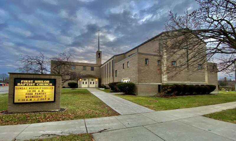 First Shiloh Baptist Church, 15 Pine Street at Swan Street, Buffalo, New York, January 2023. Dedicated in November 1965 after a construction process just over a year in length, this stout, sprawling brick building combines an 850-seat sanctuary with