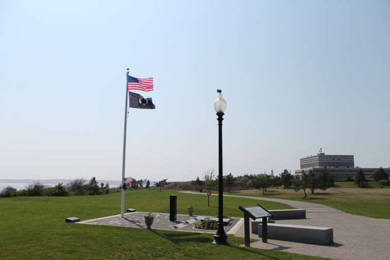 Fort Taber District Flags at Fort Tabor over the memorial.