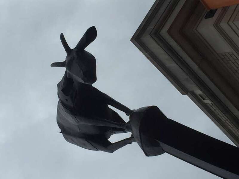 For No Apparent Reason. Painted steel and wood sculpture by artist Paul Wood. On public display in front of the Arts Council of Fayetteville, on Hay Street, in downtown Fayetteville, NC.