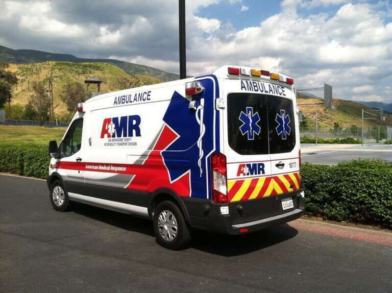 Ford Transit (2013) AMR Ambulance parked at CSUSB. Pictured side back.