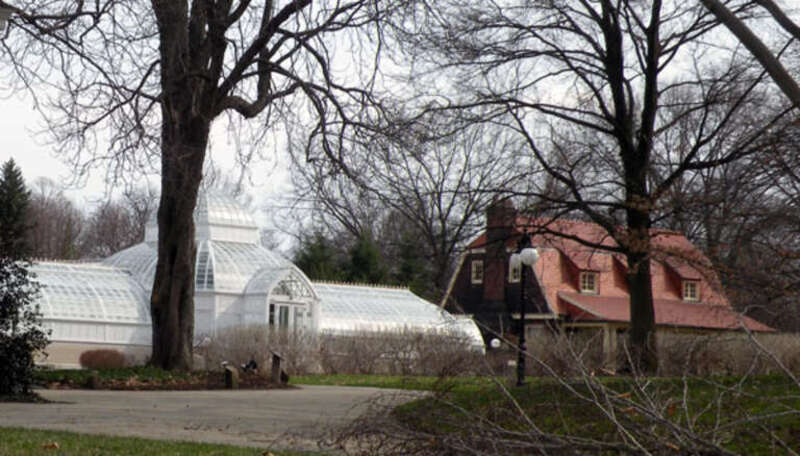 Picture of the greenhouse at the Frick Art &amp;amp; Historical Center in the Point Breeze neighborhood of Pittsburgh, Pennsylvania, on March 21, 2010.  The little house to the right of the greenhouse is the &quot;playhouse&quot; for the Frick children, which was