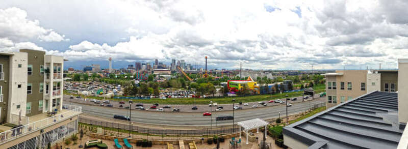 Panoramic view of downtown Denver. Done with the pano on my phone so there are some weird things going on with the traffic.