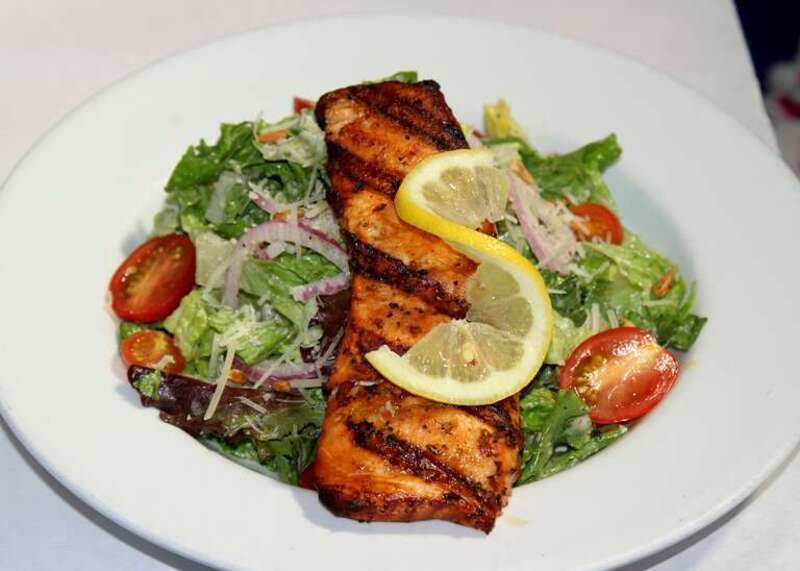 Perfectly grilled salmon filet, cut fresh daily and dipped in Elaine’s Marinade, served on Classic Caesar salad
The LEMON LEAF Cafe
Historic Down Town Lancaster
653 W. Lancaster Boulevard
Lancaster, CA 93534
&amp;lt;a href=&quot;http://www.lemonleaf.com&quot;