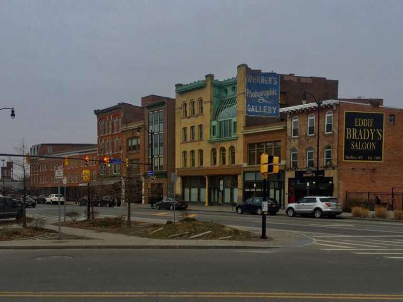 As seen in January 2020, the &quot;Genesee Gateway&quot; is the name that's been given to a row of buildings on the south side of Genesee Street between Ellicott and Oak Streets in downtown Buffalo, representing an unusually intact streetscape of 19th-century