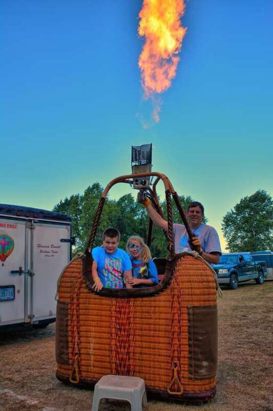 One of the ballooners was so kind as to allow some of the kids into a Gondola and light it up so they could see and feel the heat off the burner.