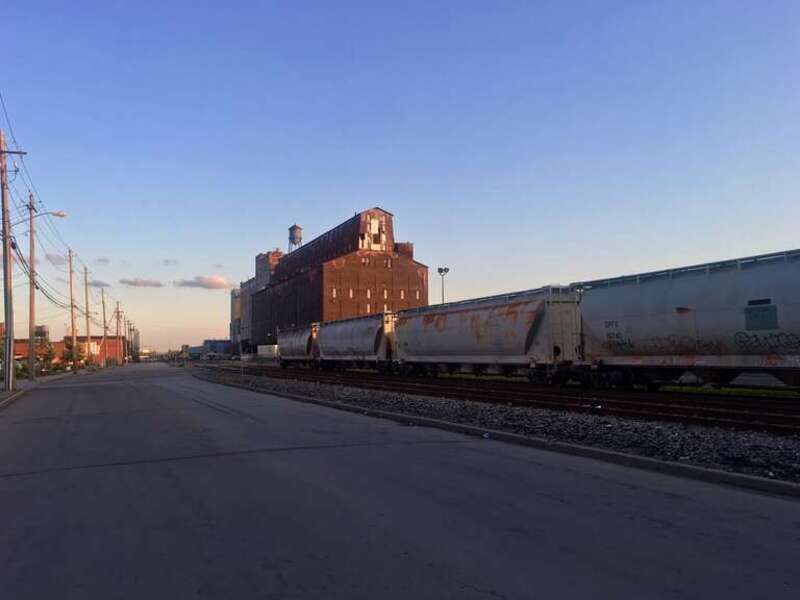 The Great Northern Elevator and the tracks of the Buffalo Creek Railroad as seen from the entrance to the Agway/GLF Elevator on Ganson Street (now the RiverWorks complex).