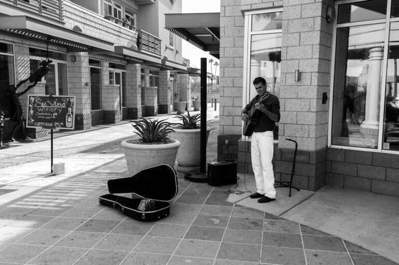 A guitarist on Main Street in Scottsdale, Arizona