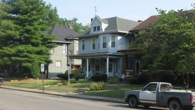 Houses on the southern side of the 900 block of E. Powell Avenue in Evansville, Indiana, United States.  The houses in this block (including the center one, built in 1905) are part of the Bayard Park Historic District, a historic district that is