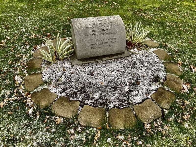 Seen in November 2021 is this memorial next to the rear parking lot of the Lackawanna Public Library in Lackawanna, New York that pays tribute to those once buried at Howard's Cemetery, a potter's field for the poor and indigent that existed on the