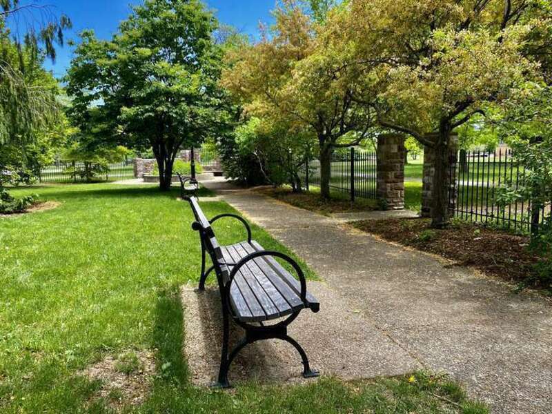 As seen in May 2021: the &quot;cottage garden&quot; at Martin Luther King, Jr. Park is tucked away inconspicuously behind the Science Museum, facing the parking lot and the park ring road. One a much grander entity, the garden traces its history back to 1932,