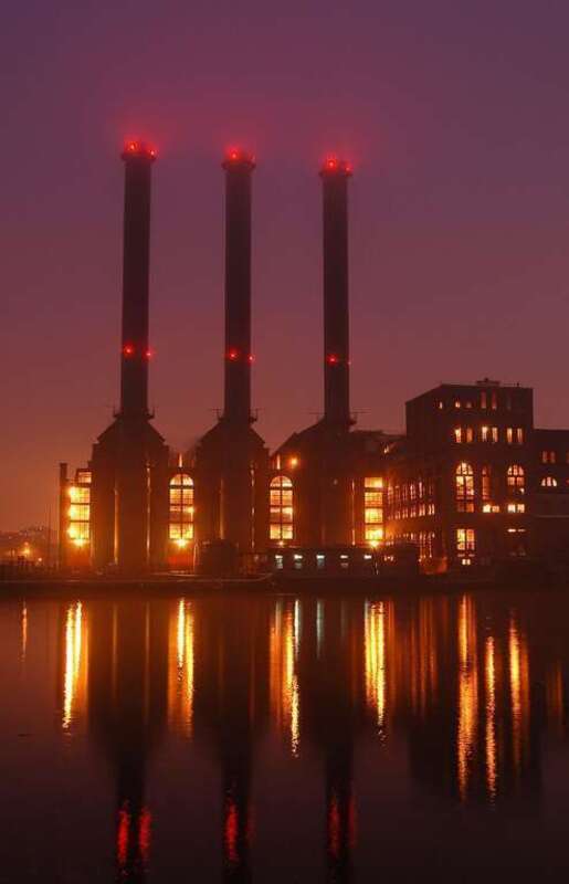 The Manchester Street Power Station in Providence, Rhode Island viewed at night from across the Providence River