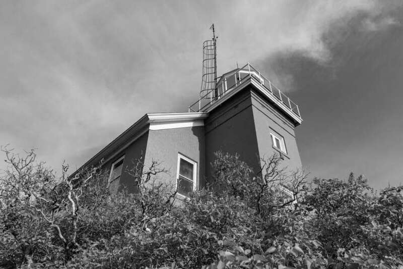 Marquette Harbor Light, Marquette, Michigan. Built: 1865. &quot;Construction of the current structure began in 1865. The 11⁄2-story dwelling shares its design with the lighthouses on Granite Island, Gull Rock and Huron Island. It includes a set of
