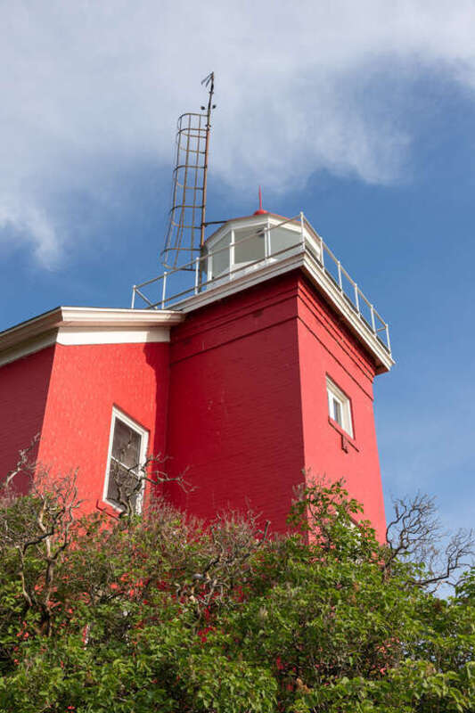Marquette Harbor Light, Marquette, Michigan. Built: 1865. &quot;Construction of the current structure began in 1865. The 11⁄2-story dwelling shares its design with the lighthouses on Granite Island, Gull Rock and Huron Island. It includes a set of