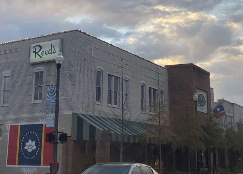 A new Mississippi magnolian flag outside in the Reed's department’s  store in Downtown Lee county (In Mississippi-Tupelo) on October 10 2021