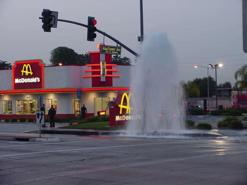 Someone clipped the fire hydrant and popped it off.  I happened by only a few minutes after, and actually beat the Monrovia Fire crew that arrived to shut off the flow.

This shot is straight from the camera, with no further adjustments.  I love the