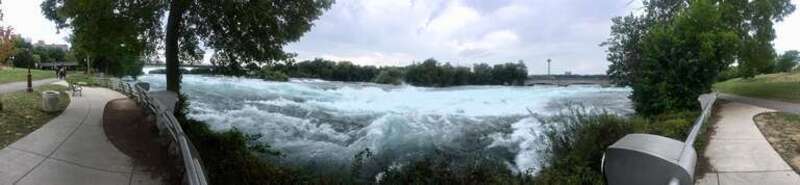Panoramic view of the rapids of the Niagara River just upstream from the falls, in Niagara Falls State Park, New York.