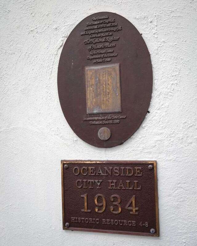 Plaques at the historic city hall in Oceanside, California, now an art museum