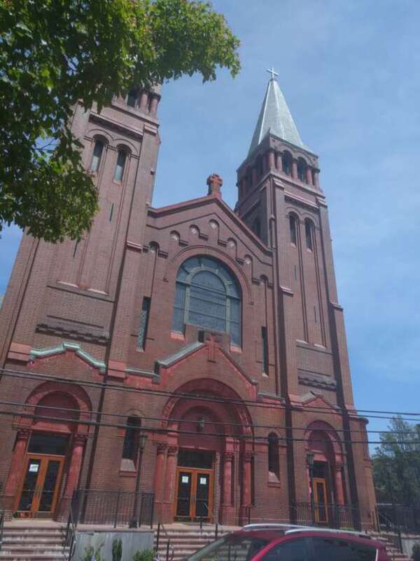 Looking northeast at church Q11804265 on a sunny day.