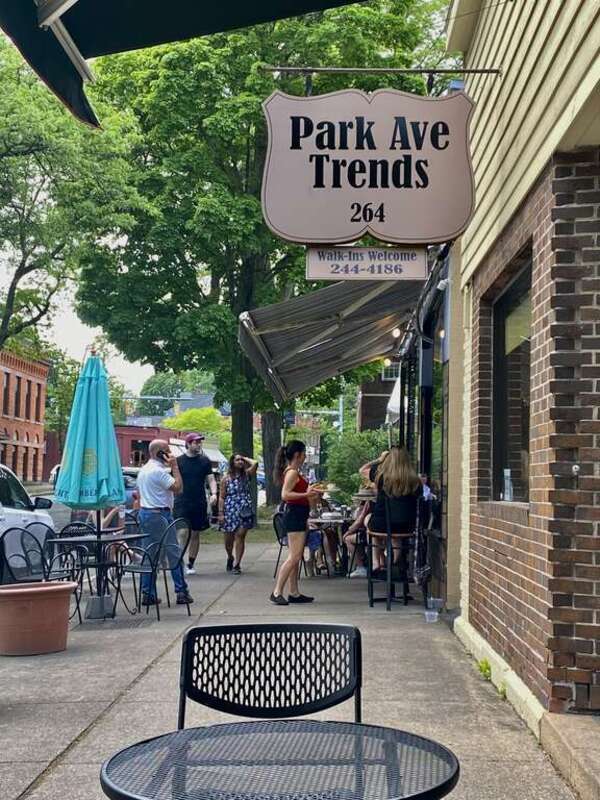 View from a pleasant lunch on the sidewalk terrace at Vasko's on Park Avenue in Rochester, New York on a May 2022 afternoon.