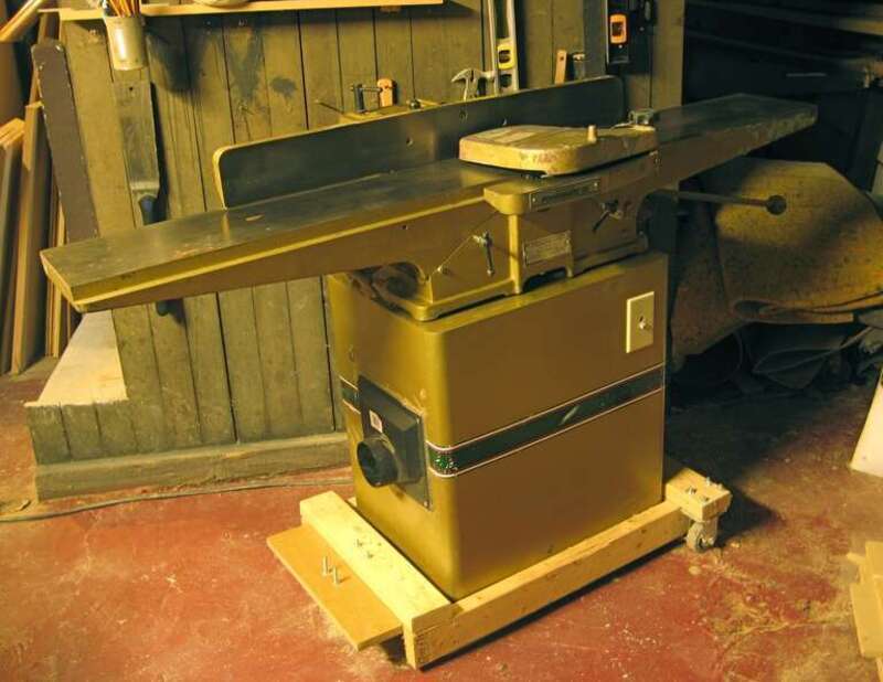 A Powermatic jointer mounted on a custom rolling base.