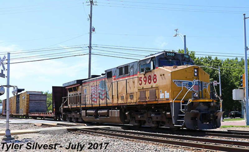 Union Pacific 7394(AC45CCTE), 8494(SD70ACe), 5801(AC44CWCTE), 8925(SD70AH) and 5988(AC44CWCTE) Leading a Southbound 9,169 feet Manifest on the BNSF Fort Scott Sub before passing over the Pflumm Road Crossing south of Santa Fe Trail Drive in Lenexa,