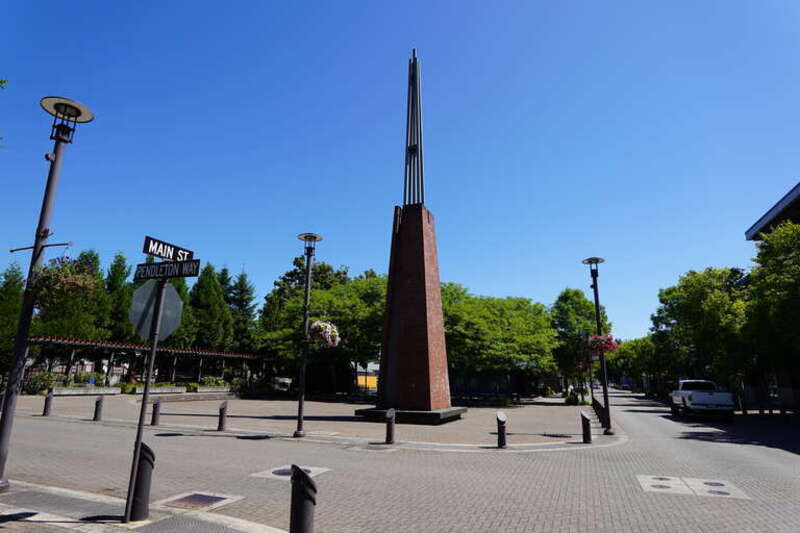 Image is of Reflection Plaza in Washougal, Washington. According a City of Washougal webpage, the Refection Plaza's tower marks the location of a well that supplied water to the town in its early years. Photograph taken on 2020-08-09T19:24Z.