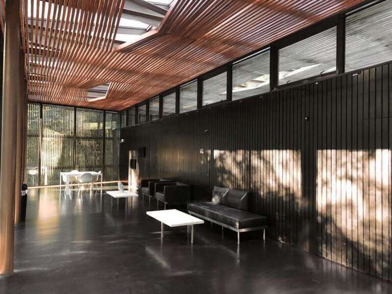 This image depicts the interior of the Ruth Lilly Visitors Pavilion at the Virginia B. Fairbanks Art &amp;amp; Nature Park: 100 Acres on the Newfields campus in Indianapolis, Indiana, U.S.