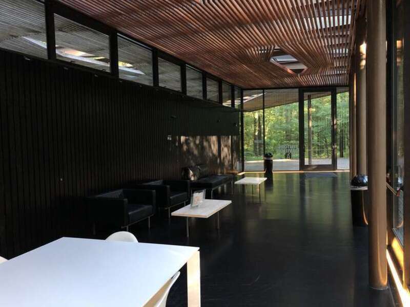 This image depicts the interior of the Ruth Lilly Visitors Pavilion at the Virginia B. Fairbanks Art &amp;amp; Nature Park: 100 Acres on the Newfields campus in Indianapolis, Indiana, U.S.