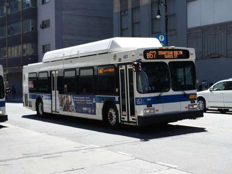 A Downtown Brooklyn–Sands Street-bound B67 bus traveling north on Smith Street at Livingston Street towards Fulton Mall in Downtown Brooklyn.