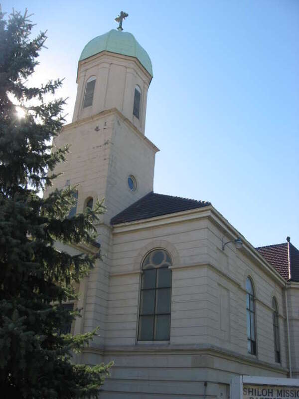 Front and northern side of the former St. Ladislaus' Catholic Church (now Shiloh Missionary Baptist Church), located at 2908 Wood Avenue in Lorain, Ohio, United States.  Built in 1904, it is listed on the National Register of Historic Places.