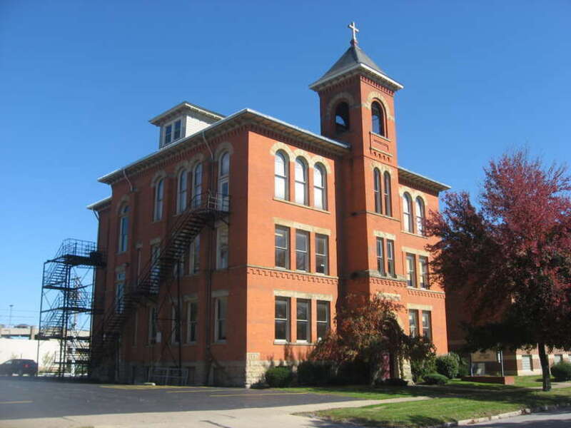 Front and western side of St. Mary's Catholic School, located at 320 Middle Avenue in Elyria, Ohio, United States.  Built in 1906, it is listed on the National Register of Historic Places, and it is part of a Register-listed historic district, the