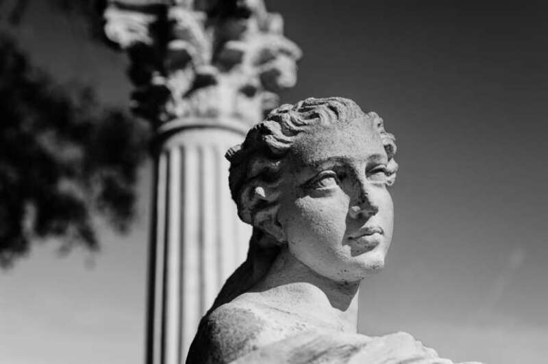 500px provided description: I took this at Kapok Gardens in Clearwater, FL. Really neat place and good for some black and white shots. [#black and white ,#statue ,#marble ,#Nikon D700]