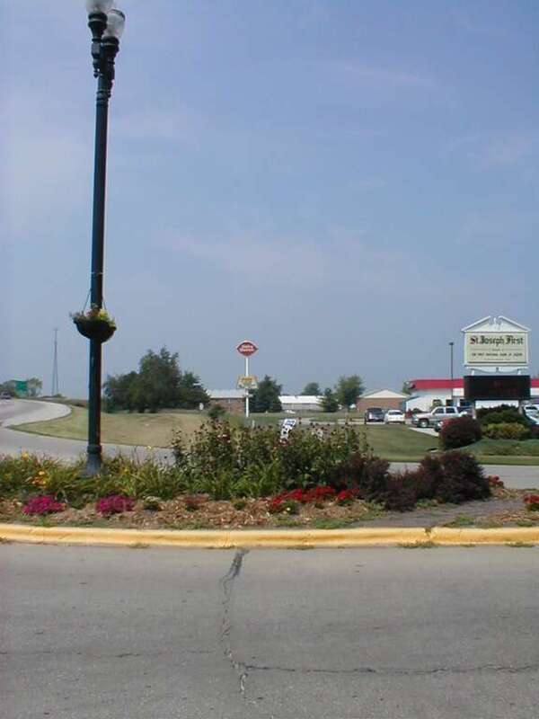 A distant view of the St. Joseph, Illinois Dairy Queen sign as well as the bank.  Just south of I-74 exit 192.